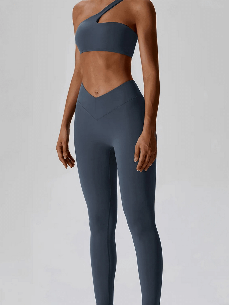 "Sports One Shoulder Push-up Bra and Leggings SF1697 in solid dark color for women, breathable fabric, perfect for exercise"